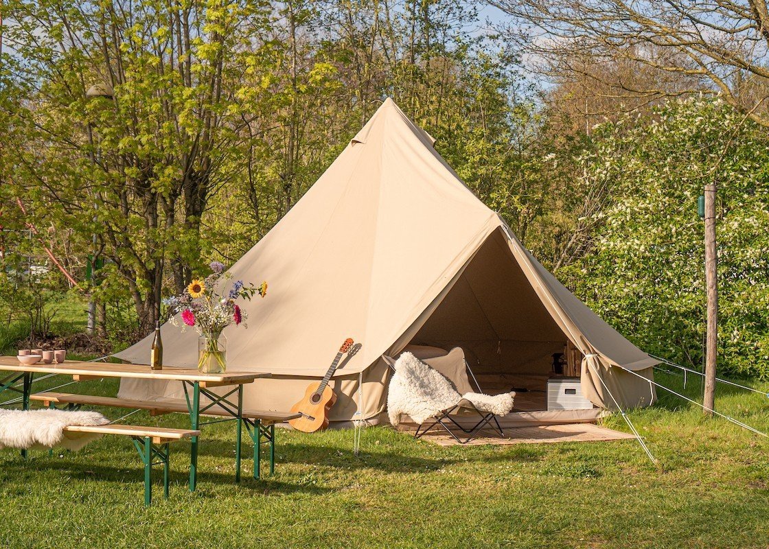 Luxury Bell tent with private toilet and made-up bed